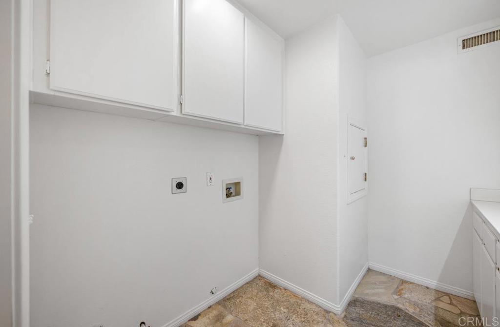 4009 Pala Mesa Oaks Drive Fallbrook, CA 92028 - Photo 16 of 45 a view of storage and utility room with empty racks