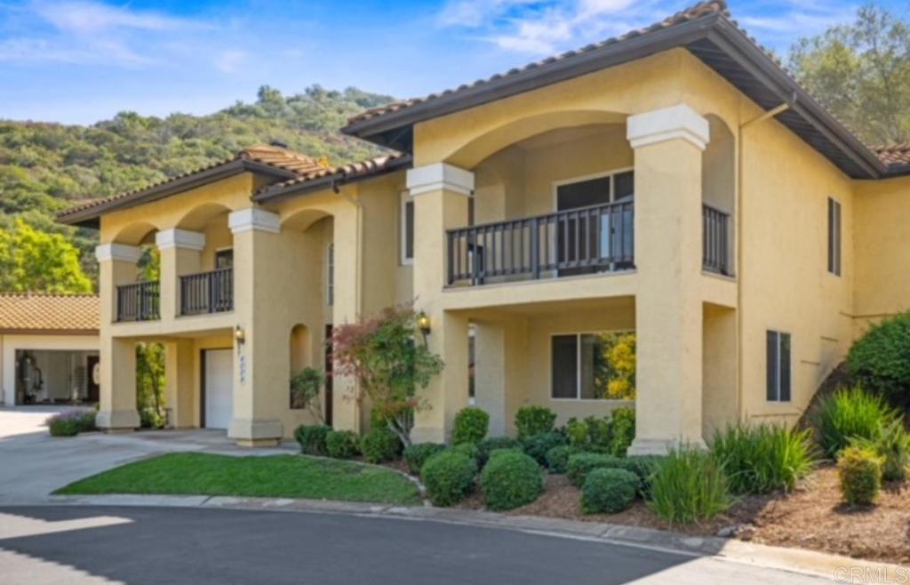 4009 Pala Mesa Oaks Drive Fallbrook, CA 92028 - Photo 2 of 45 a front view of a house with a yard