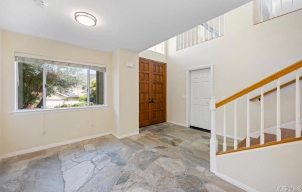 4009 Pala Mesa Oaks Drive Fallbrook, CA 92028 - Photo 4 of 45 a view of an entryway with wooden floor