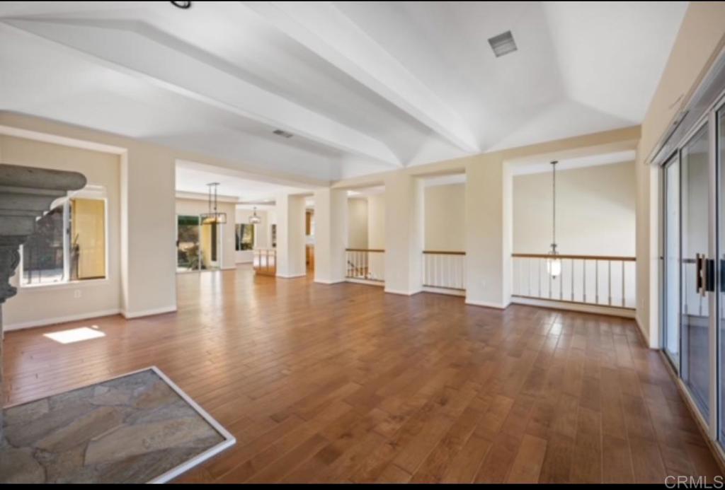 4009 Pala Mesa Oaks Drive Fallbrook, CA 92028 - Photo 8 of 45 wooden floor in an empty room with a window