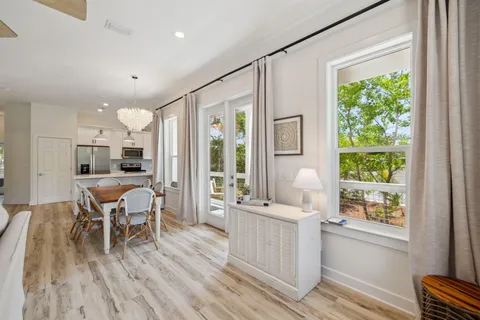 a kitchen with stainless steel appliances a refrigerator sink and cabinets