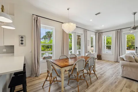 a bedroom with a large bed and a large window