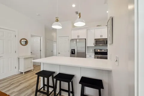 a view of balcony with furniture