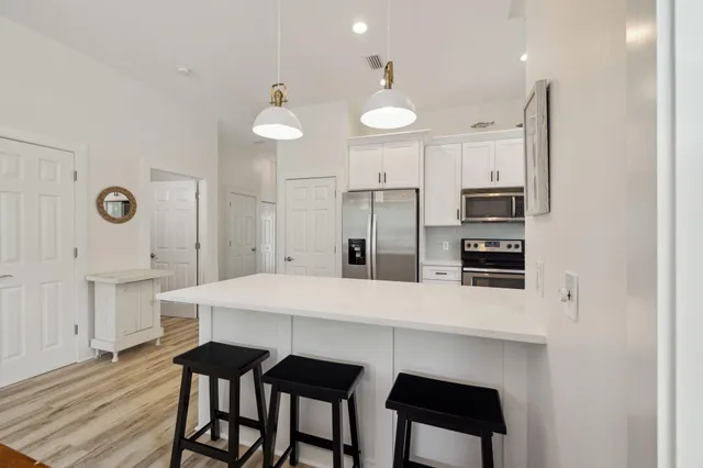 a view of balcony with furniture
