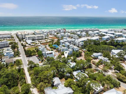 front view of a house with a tree