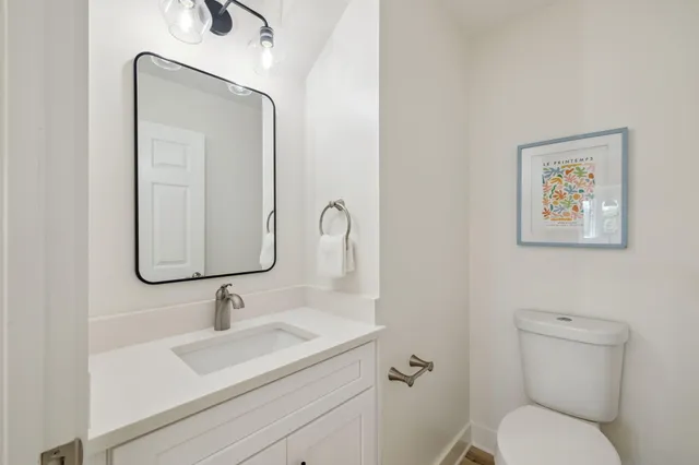 a view of a house with swimming pool and sitting area