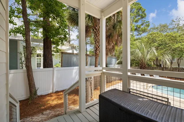 a bedroom with a bed and a table