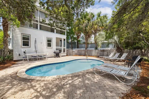 a view of a balcony with wooden floor