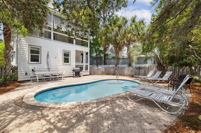a view of a balcony with wooden floor