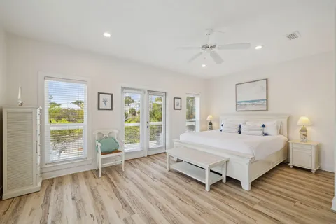 a view of balcony with two chairs and a table