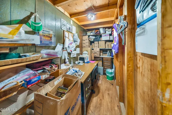 a spacious bathroom with a sink mirror and toilet