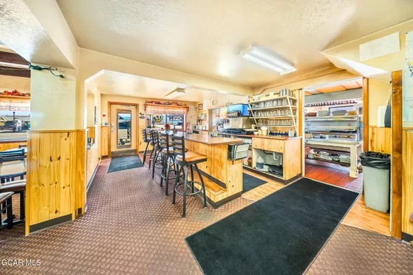 a view of a dining room with furniture