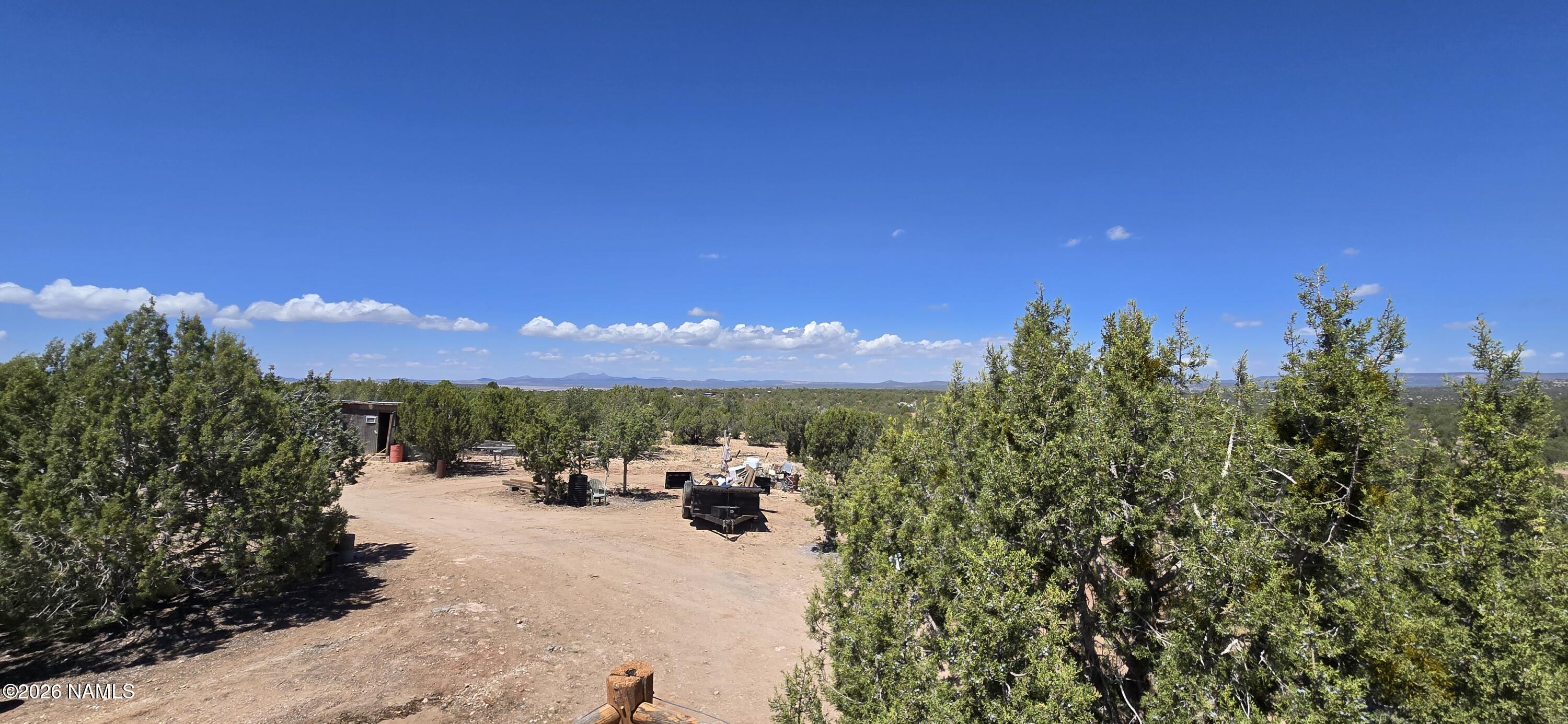2795 Poppy Road Ash Fork, AZ 86320 - Photo 33 of 56 a view of a lake with a city