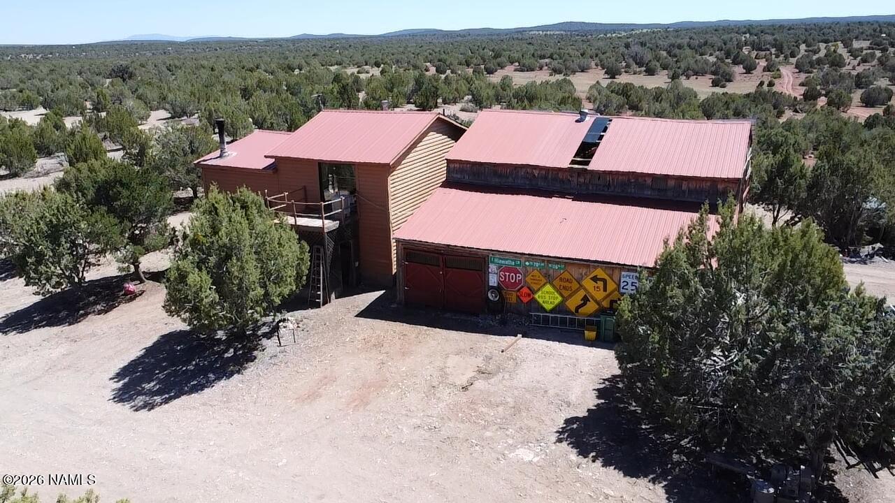 2795 Poppy Road Ash Fork, AZ 86320 - Photo 41 of 56 an aerial view of a house with a yard