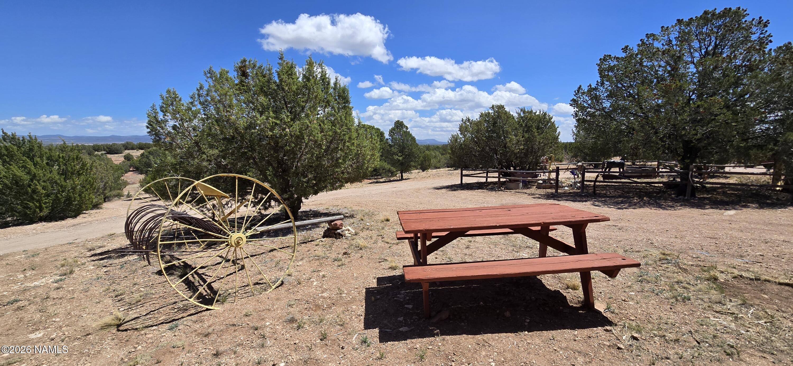 2795 Poppy Road Ash Fork, AZ 86320 - Photo 7 of 56 a view of a backyard with sitting area