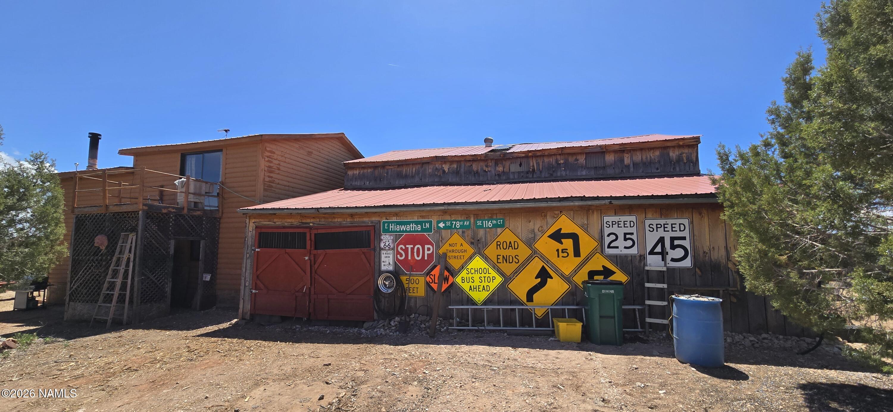 2795 Poppy Road Ash Fork, AZ 86320 - Photo 9 of 56 a street sign on the wall of building