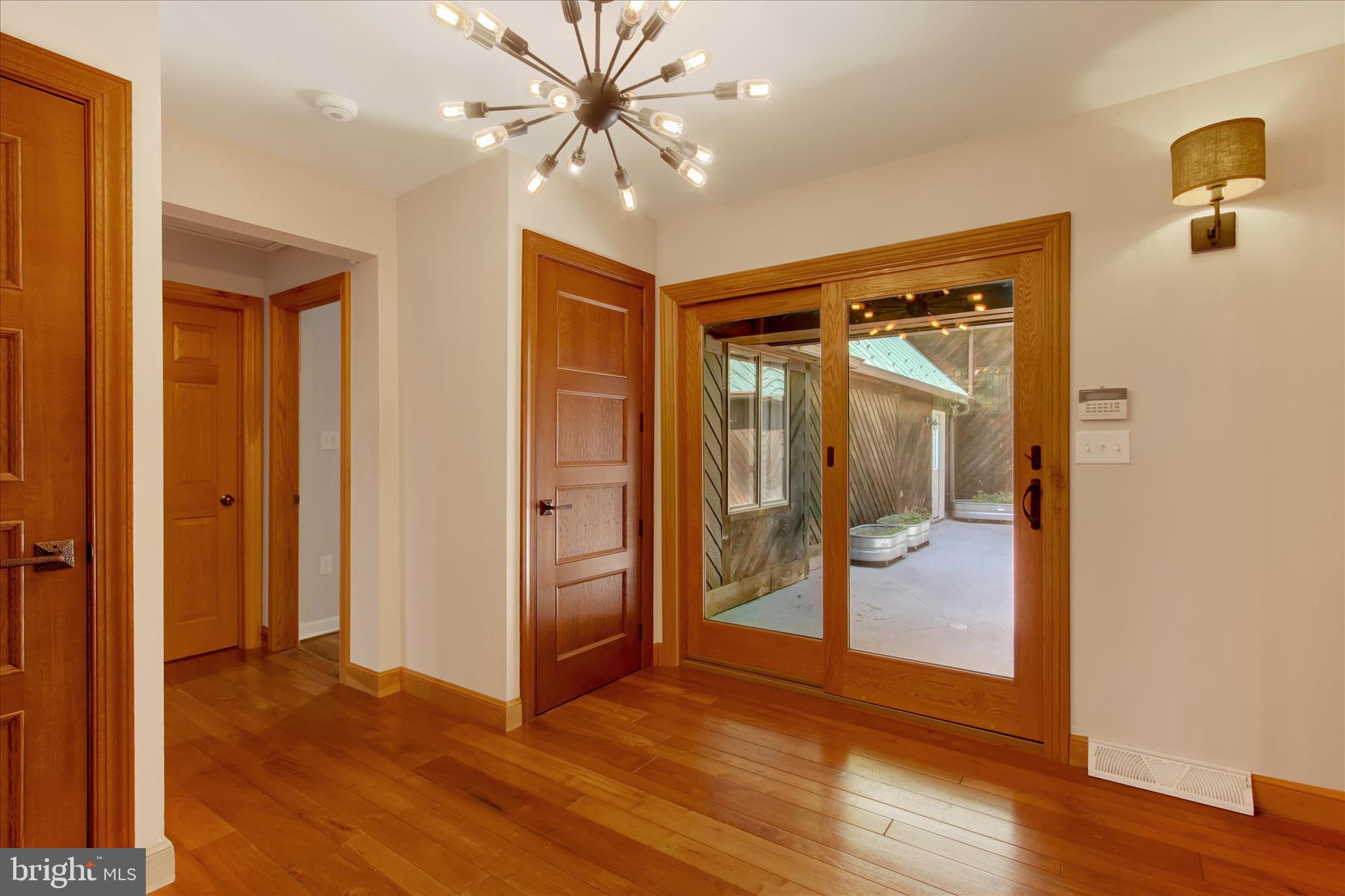 1855 Westwood Road York, PA 17403 - Photo 4 of 60 a view of a hallway with wooden floor and closet area