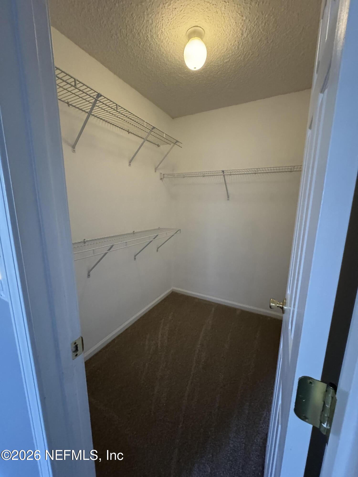2725 Ravine Hill Drive Middleburg, FL 32068 - Photo 14 of 23 a view of storage and utility room with empty racks