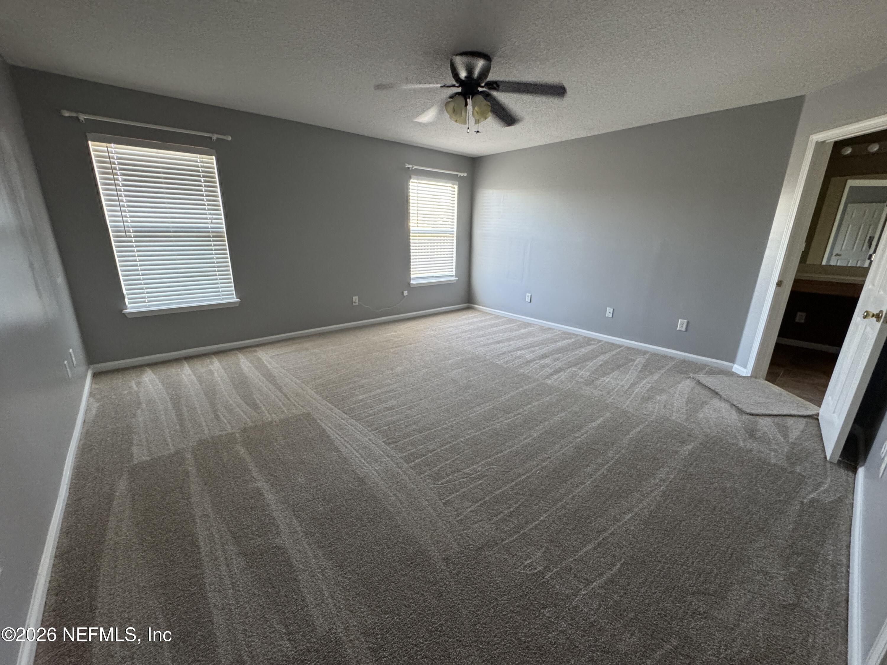 2725 Ravine Hill Drive Middleburg, FL 32068 - Photo 15 of 23 a view of empty room with windows