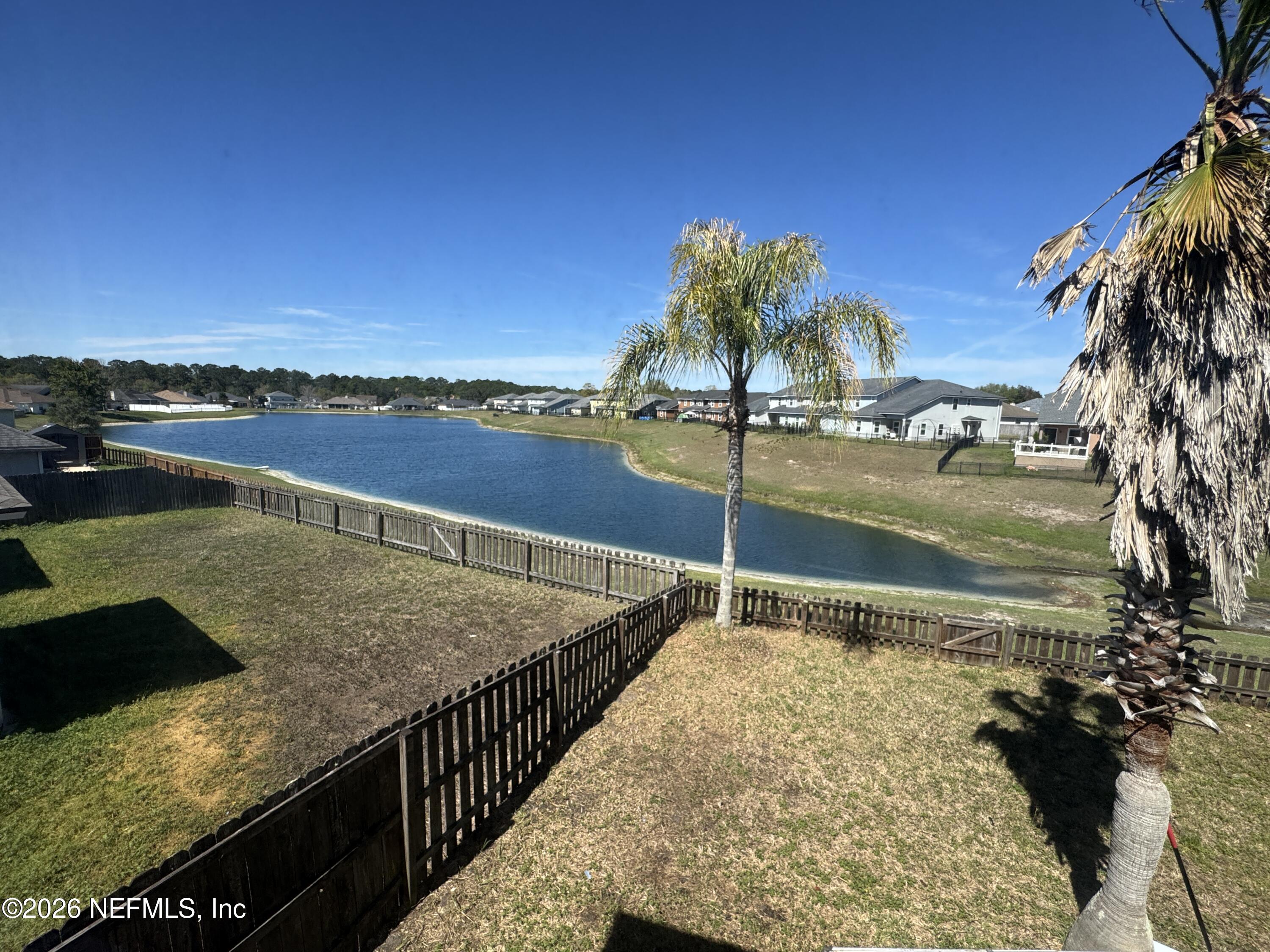 2725 Ravine Hill Drive Middleburg, FL 32068 - Photo 23 of 23 a view of a lake with a terrace