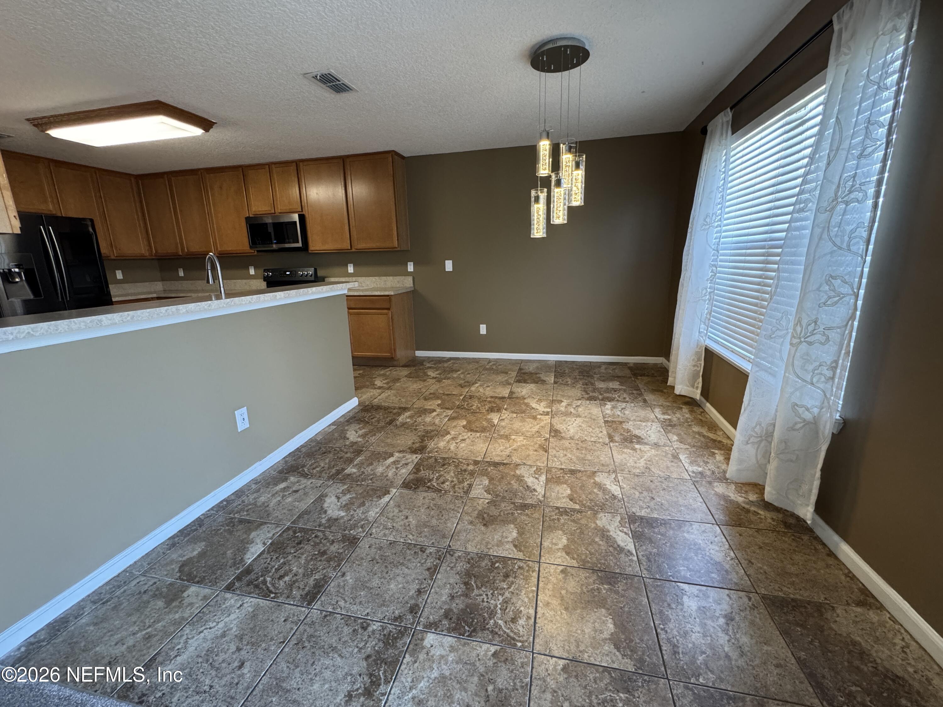 2725 Ravine Hill Drive Middleburg, FL 32068 - Photo 6 of 23 a view of kitchen with window
