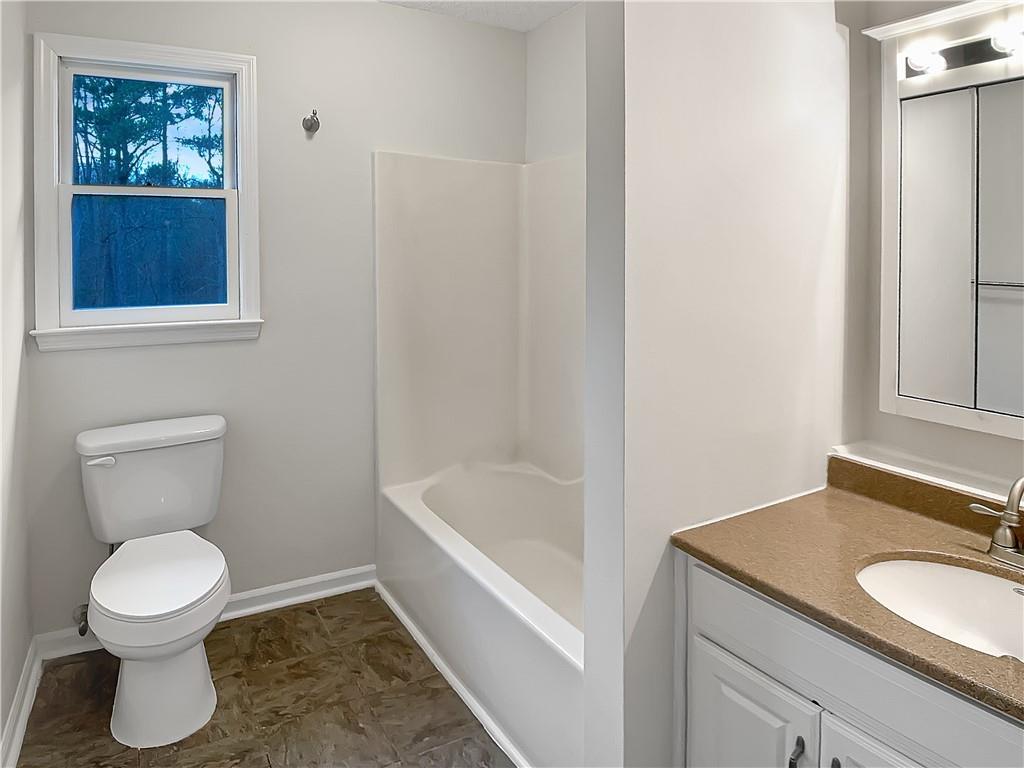 155 Ridgeview Drive Athens, GA 30606 - Photo 18 of 23 a bathroom with a toilet a sink and bathtub