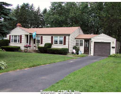 29 Meadowlark Road Enfield, CT 06082 - Photo 1 of 1 a front view of a house with garden