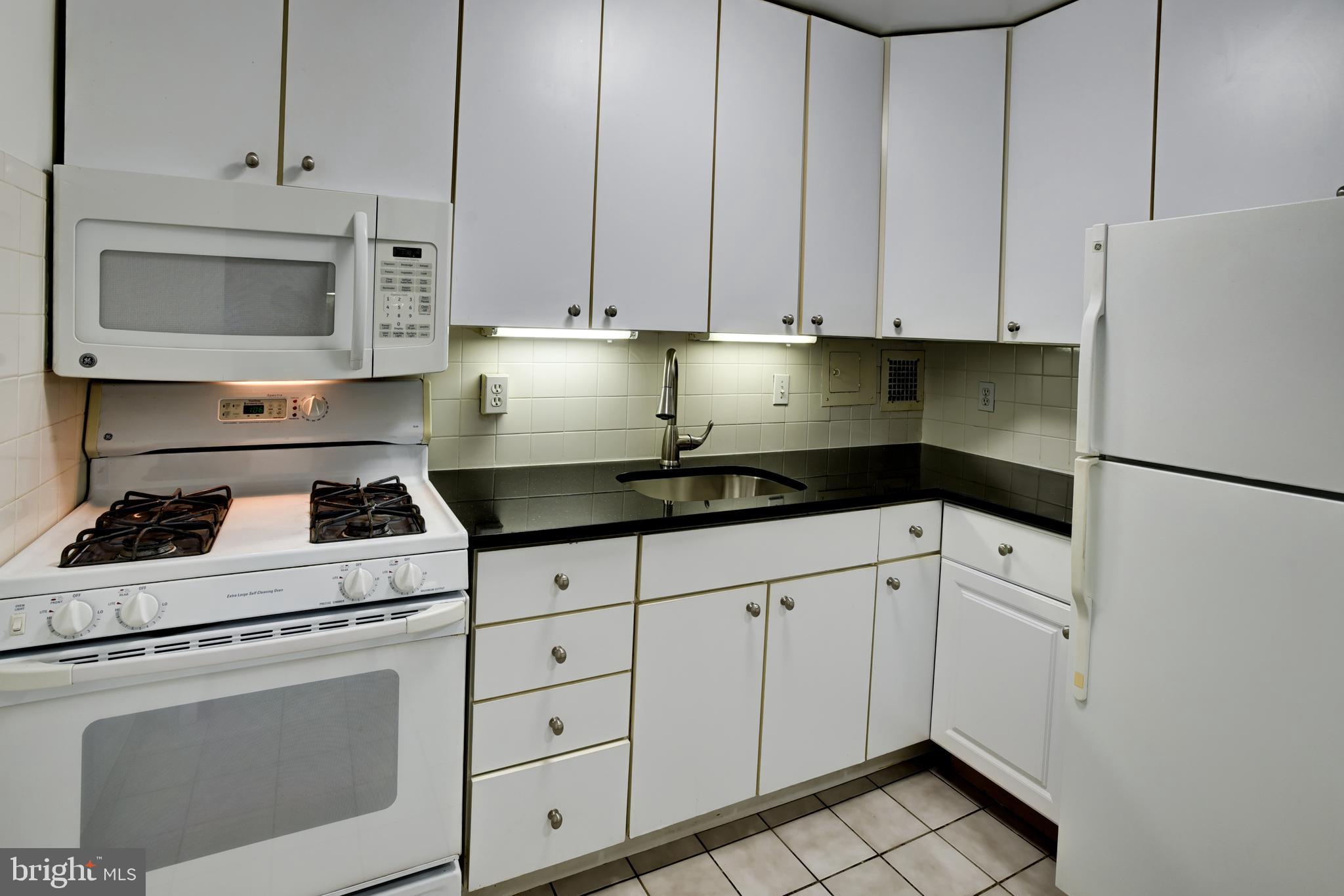2401 H Street Northwest, Unit 208 Washington, DC 20037 - Photo 18 of 37 Kitchen with Under Cabinet Lighting