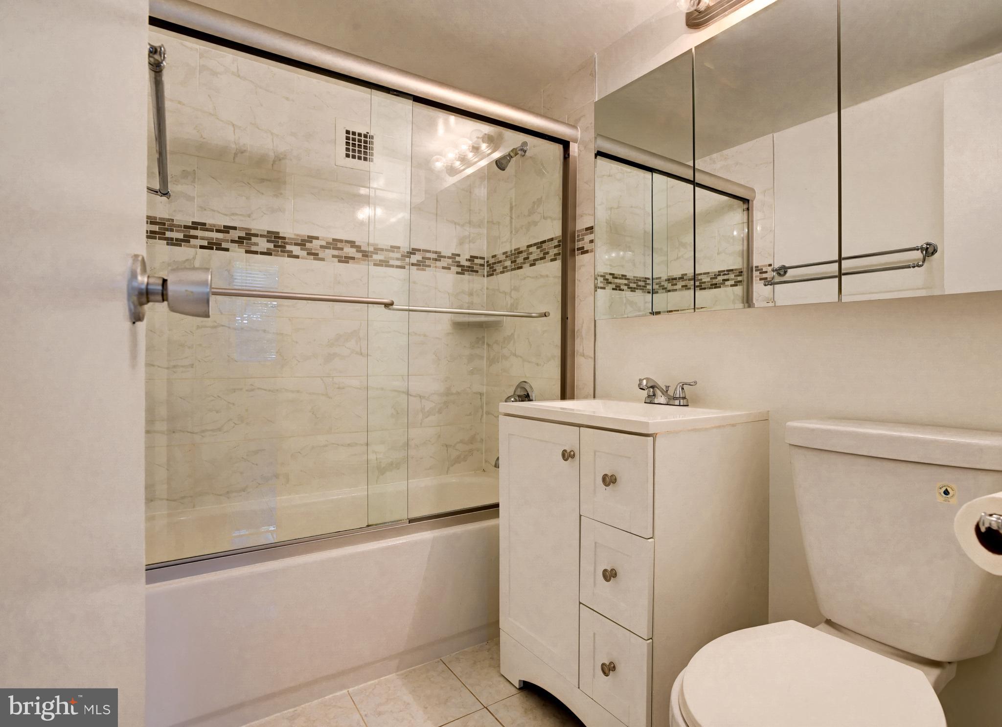 2401 H Street Northwest, Unit 208 Washington, DC 20037 - Photo 7 of 37 Renovated Bathroom