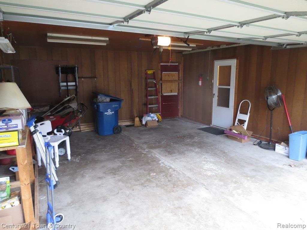 4170 England Beach Road White Lake, MI 48383 - Photo 18 of 23 Large Deep Garage with Service Door