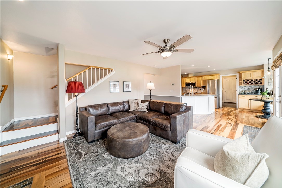 18828 Nutmeg Street Southwest Rochester, WA 98579 - Photo 11 of 25 a living room with furniture a rug and white walls