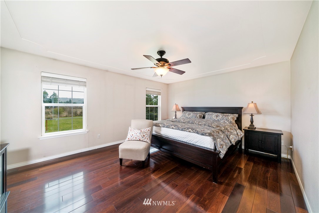 18828 Nutmeg Street Southwest Rochester, WA 98579 - Photo 13 of 25 a bed room with a bed and a window