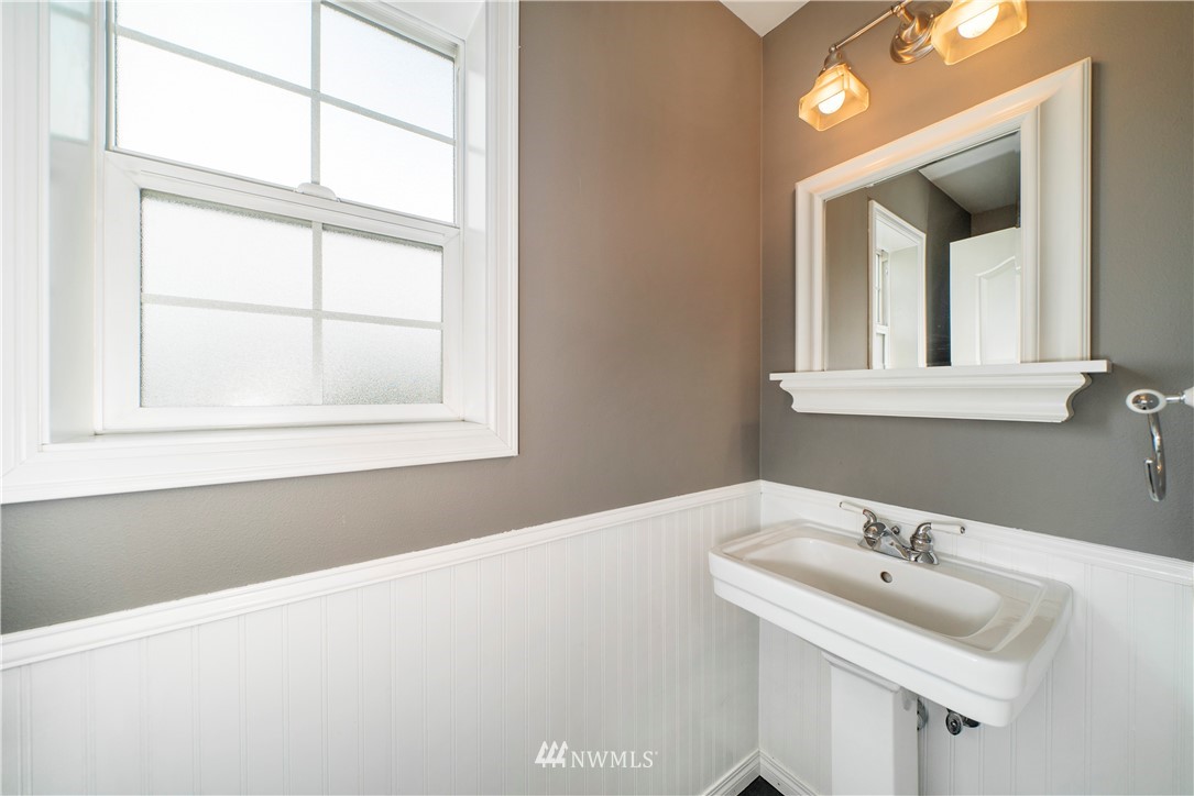 18828 Nutmeg Street Southwest Rochester, WA 98579 - Photo 21 of 25 a bathroom with a sink and a mirror