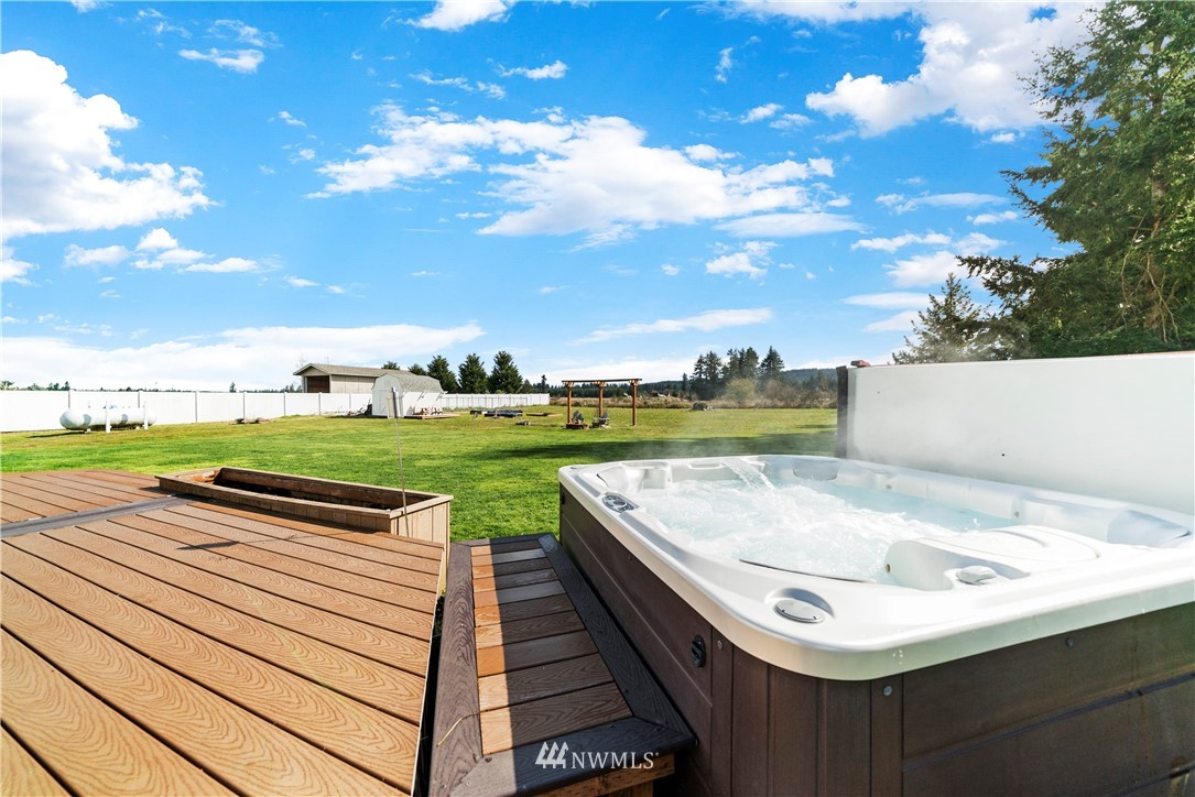 18828 Nutmeg Street Southwest Rochester, WA 98579 - Photo 24 of 25 a view of a terrace with outdoor space
