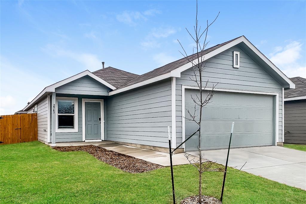 2943 Wallace Wls Court Crandall, TX 75114 - Photo 1 of 16 a front view of a house with a garden