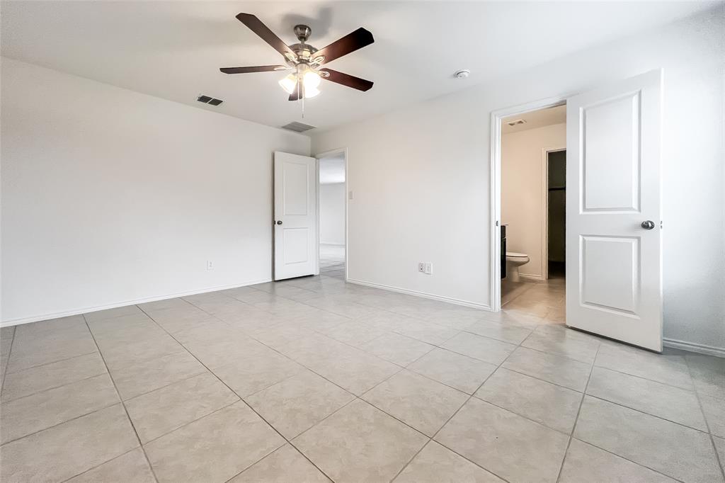 2943 Wallace Wls Court Crandall, TX 75114 - Photo 8 of 16 an empty room with closet and fan