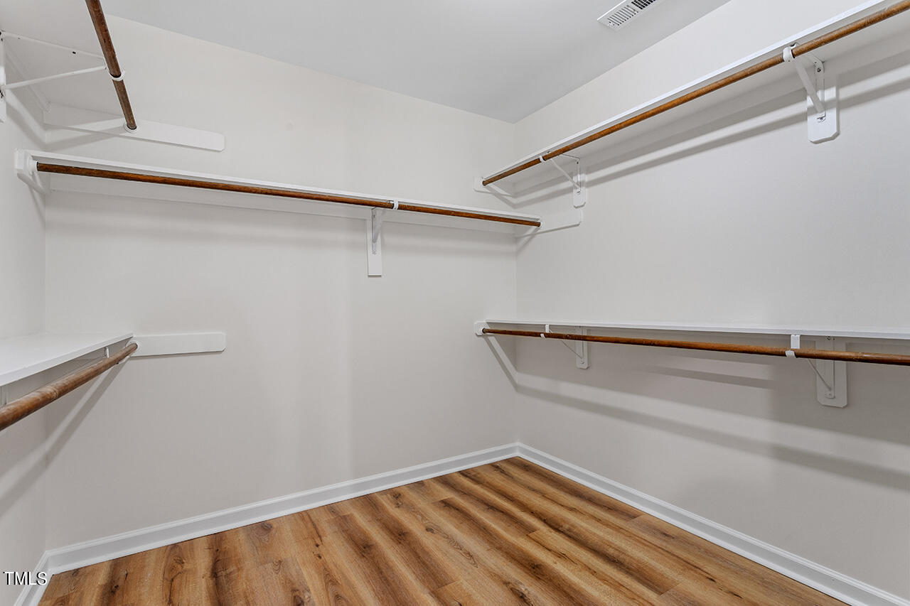 9004 Admaston Drive Raleigh, NC 27613 - Photo 23 of 30 Plenty of storage room in the closet, conveniently located off of the ensuite bathroom.