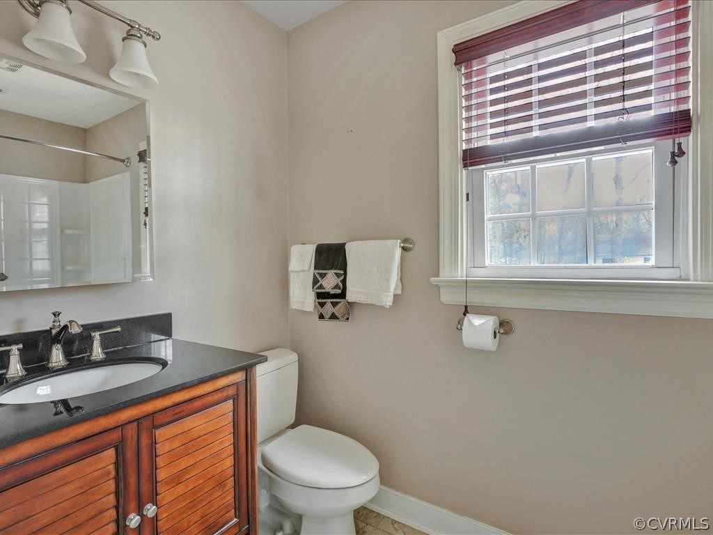 2251 Winterfield Road Midlothian, VA 23113 - Photo 17 of 27 a bathroom with a granite countertop sink toilet and mirror