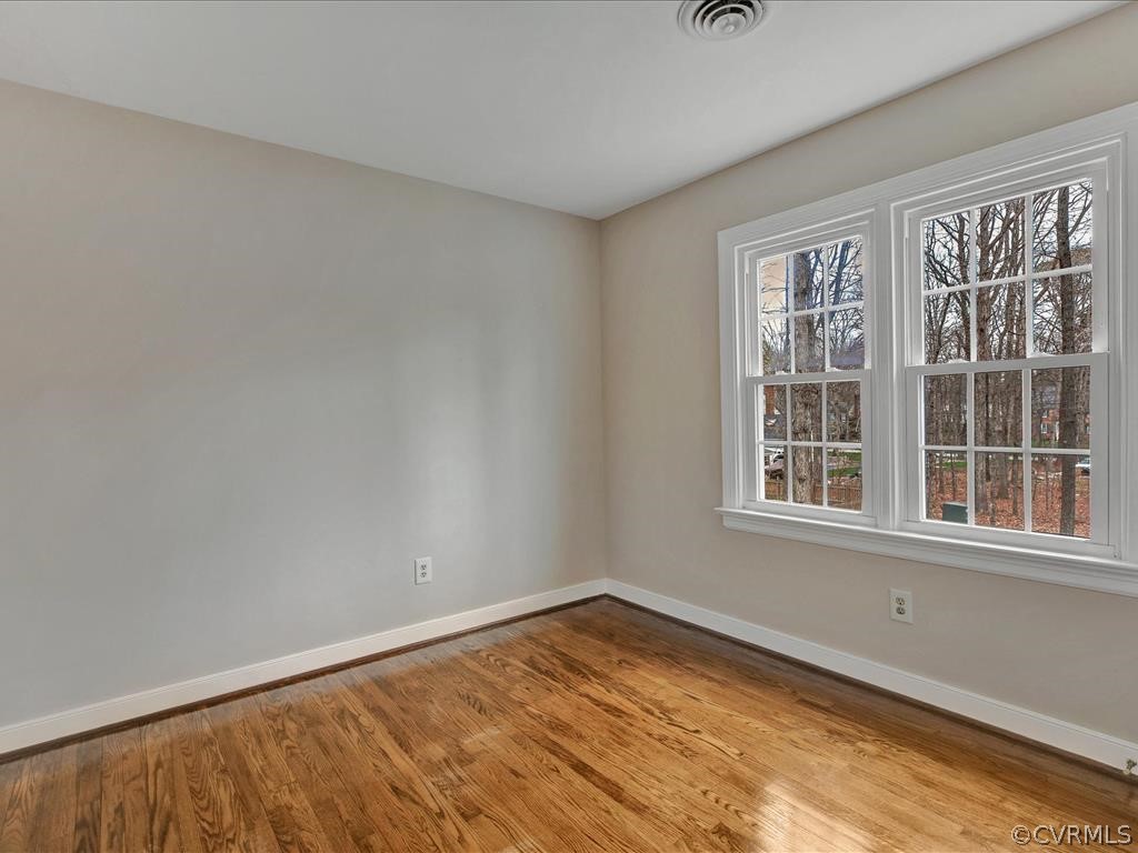 2251 Winterfield Road Midlothian, VA 23113 - Photo 18 of 27 a view of empty room with wooden floor and fan