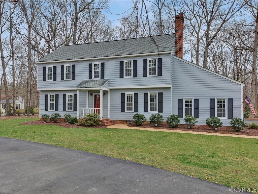 2251 Winterfield Road Midlothian, VA 23113 - Photo 2 of 27 a front view of house with yard and green space