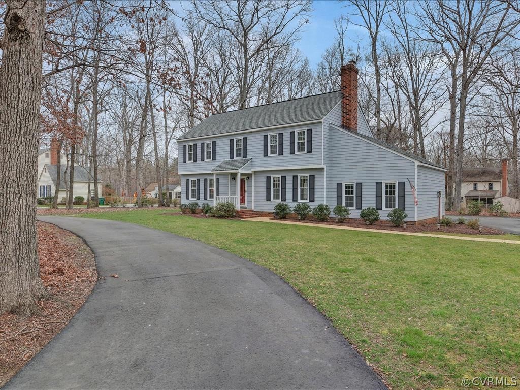 2251 Winterfield Road Midlothian, VA 23113 - Photo 27 of 27 a front view of a house with a garden and trees