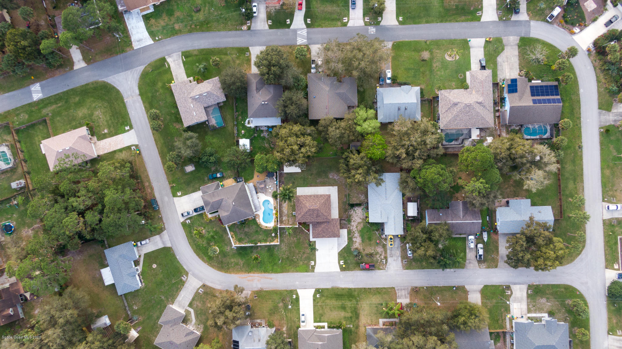 6150 Degan Road Cocoa, FL 32927 - Photo 2 of 48 an aerial view of a house with a garden