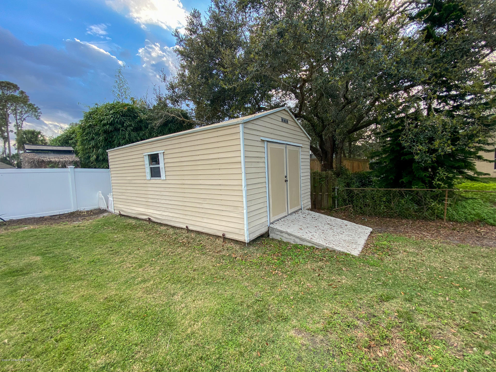 6150 Degan Road Cocoa, FL 32927 - Photo 11 of 48 a view of a backyard