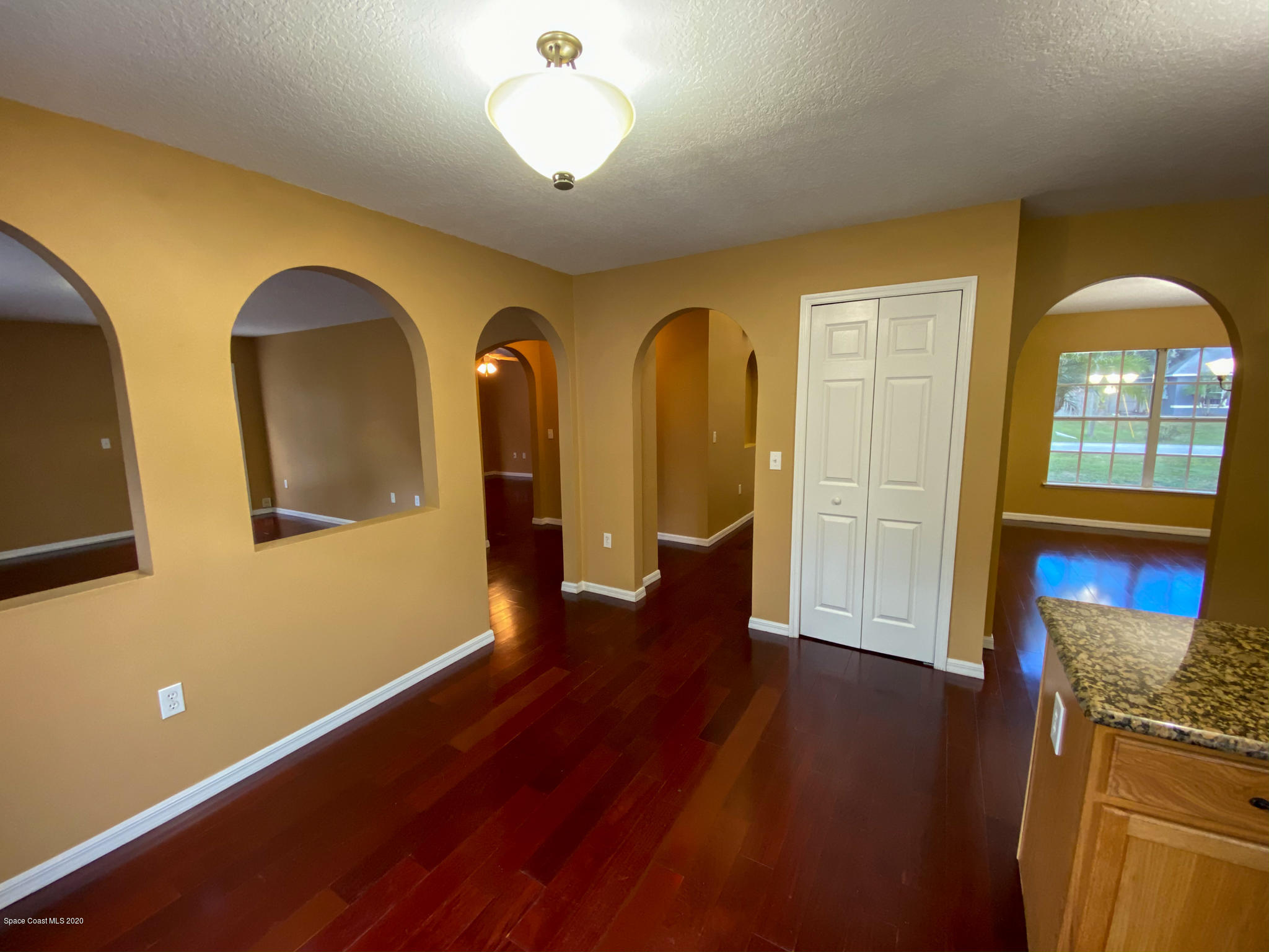 6150 Degan Road Cocoa, FL 32927 - Photo 18 of 48 a view of a livingroom with wooden floor