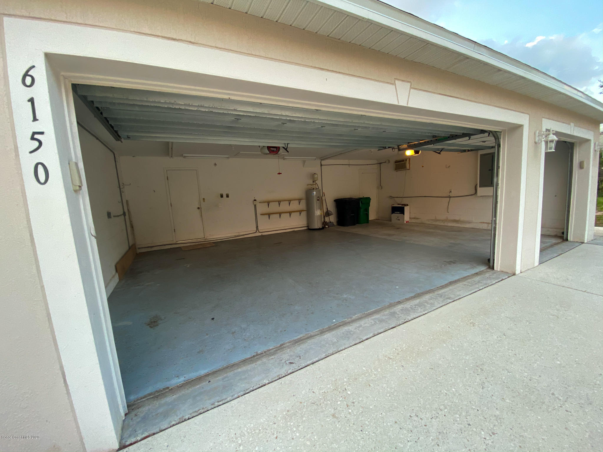 6150 Degan Road Cocoa, FL 32927 - Photo 5 of 48 a view of a livingroom with an empty space