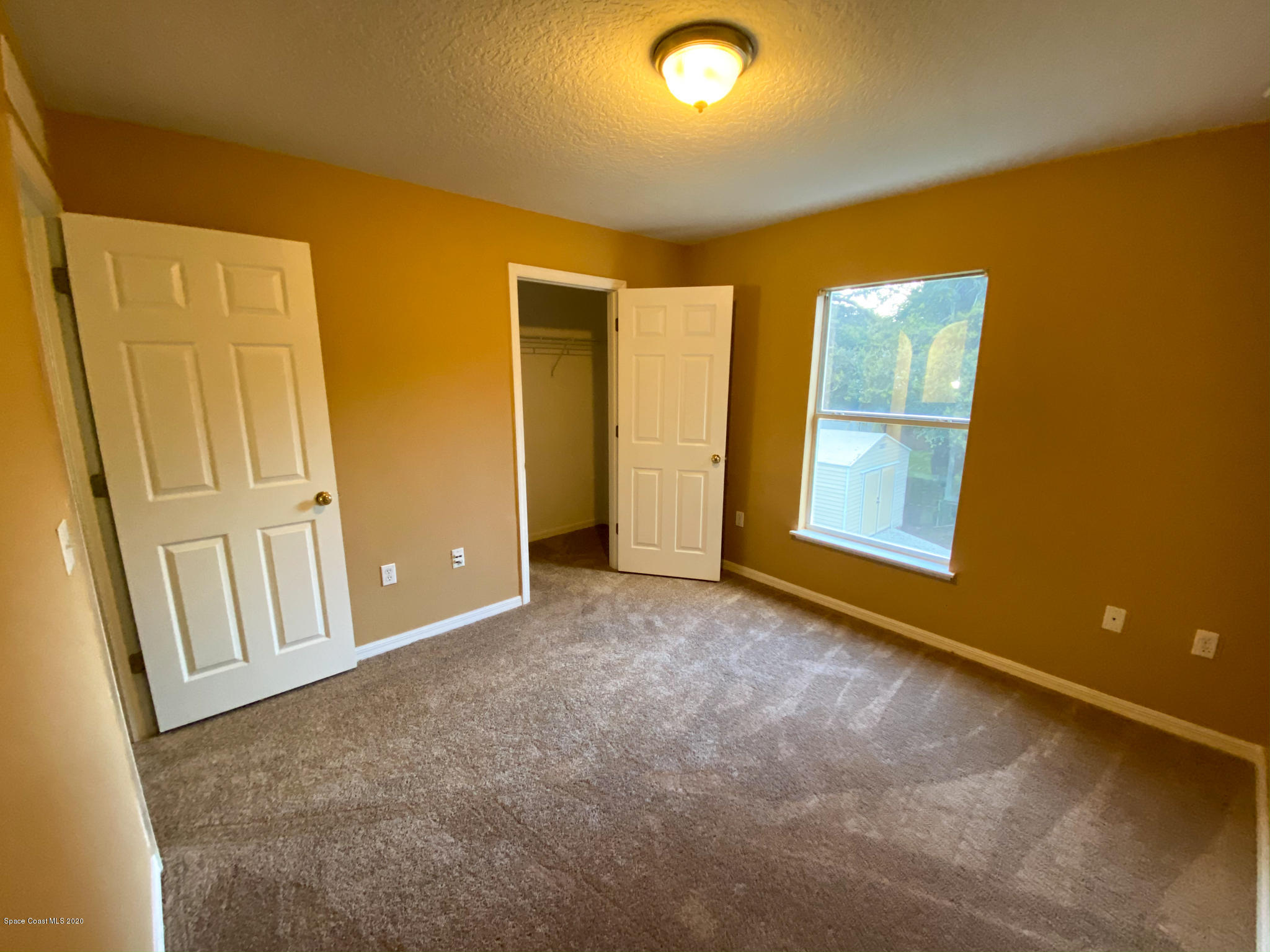 6150 Degan Road Cocoa, FL 32927 - Photo 42 of 48 an empty room with windows