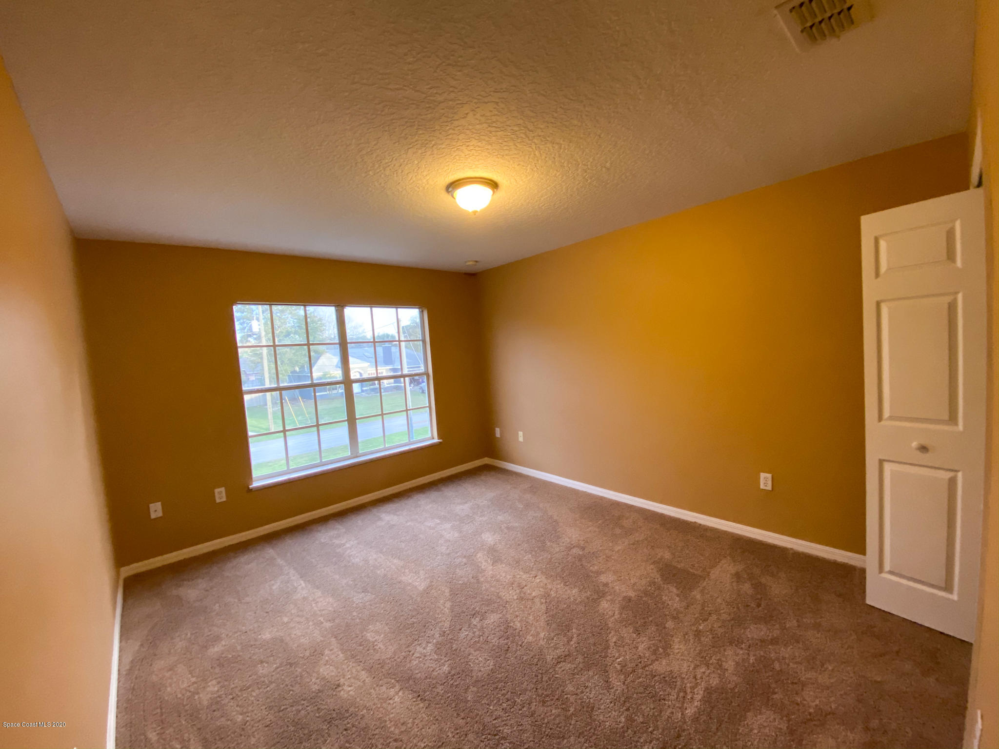 6150 Degan Road Cocoa, FL 32927 - Photo 46 of 48 an empty room with windows