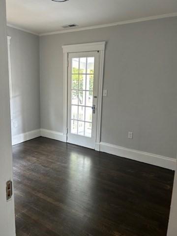 86 Aberdeen Avenue, Unit 2 Cambridge, MA 02138 - Photo 5 of 21 an empty room with wooden floor and windows