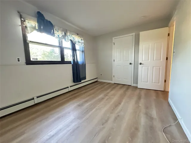 a bathroom with a sink a mirror and vanity
