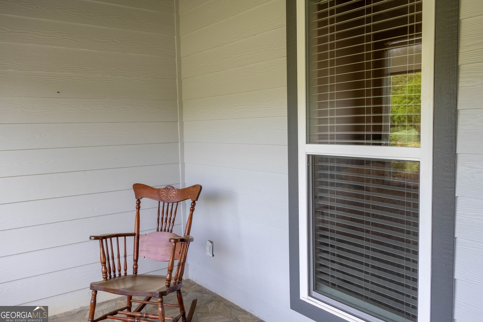 212 Old Clarkesville Mill Road, Unit C Clarkesville, GA 30523 - Photo 15 of 55 a view of chair and table in the back